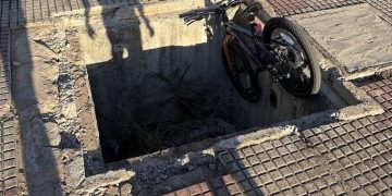 Niño cae con su bici en un registro destapado en la Costanera de Asunción