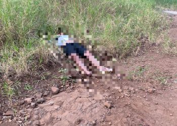 Hallan cadáver al costado de un camino vecinal